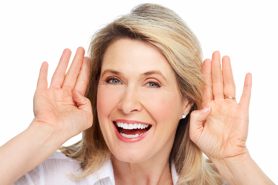 Senior woman portrait. Isolated over white background.