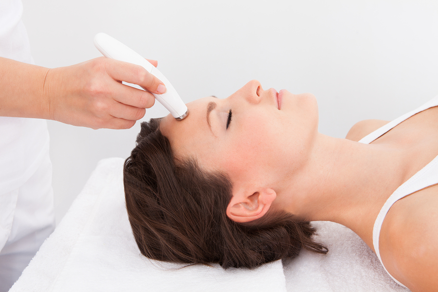 Woman Under Going Microdermabrasion Treatment